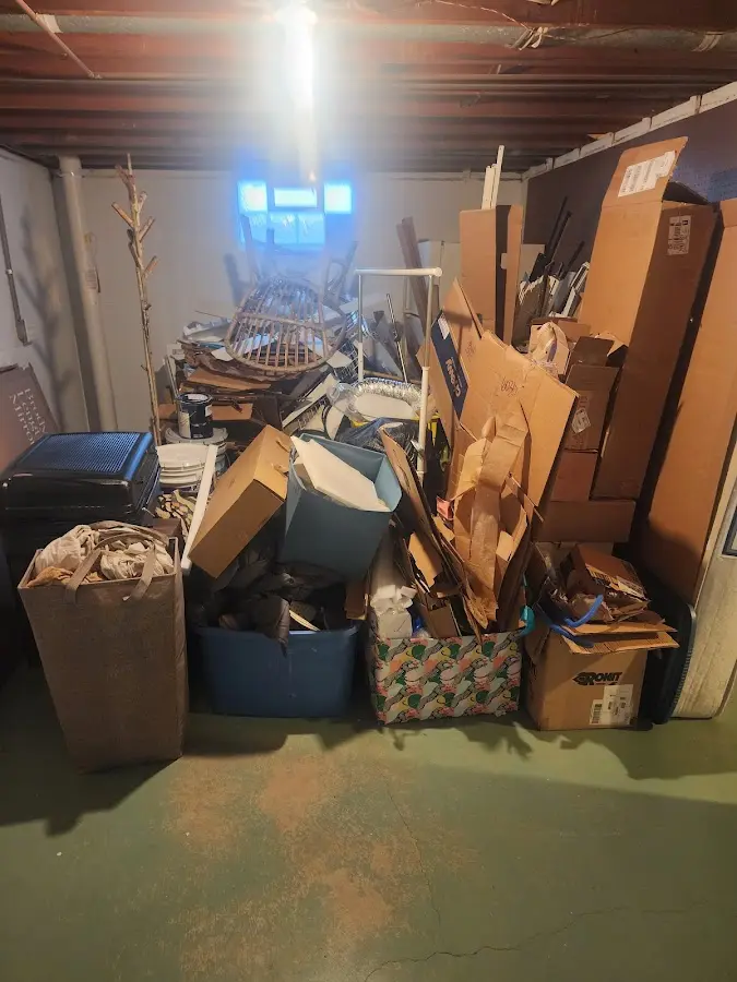 Roll-off dumpster container at job site for Roll Off Dumpster Rental in Milltown